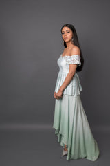 Aqua off shoulder peplum top with high-low skirt.